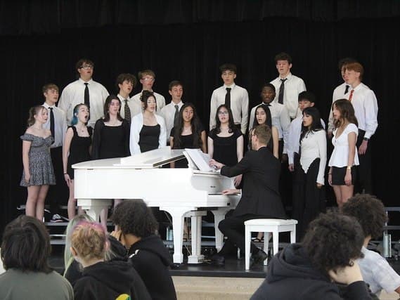 The Madison Highland Prep choir performing on stage