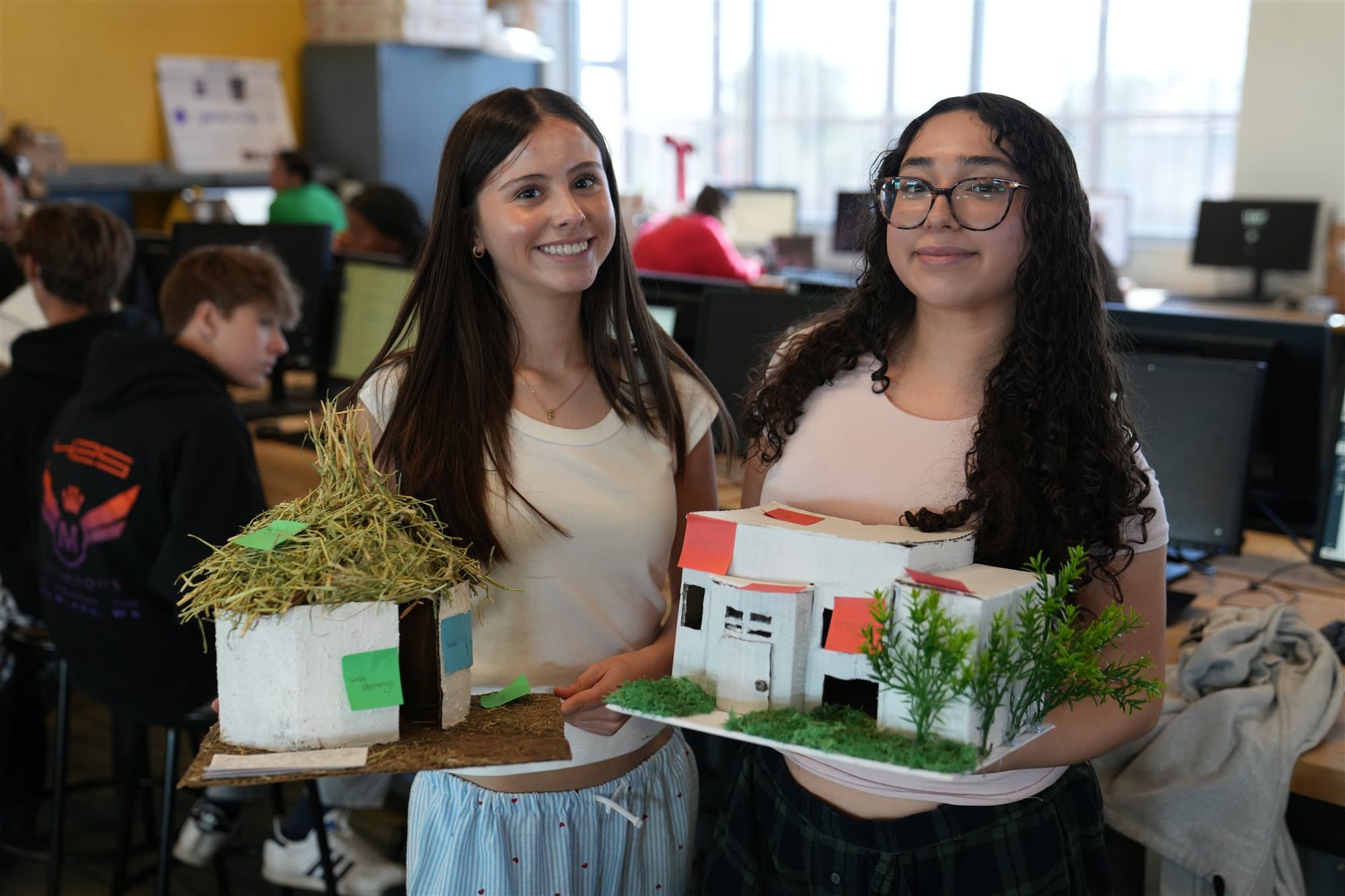 Madison Highland Prep students working together on an engineering bridge project