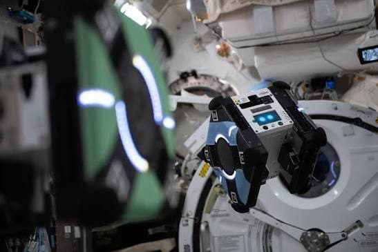 Free-flying satellite robots aboard the International Space Station used in the Zero Robotics competition